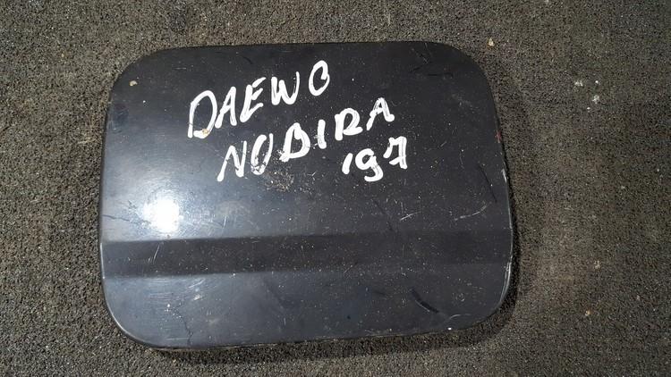 Kuro bako dangtelis isorinis nenustatytas nenustatytas Daewoo NUBIRA 1999 1.6