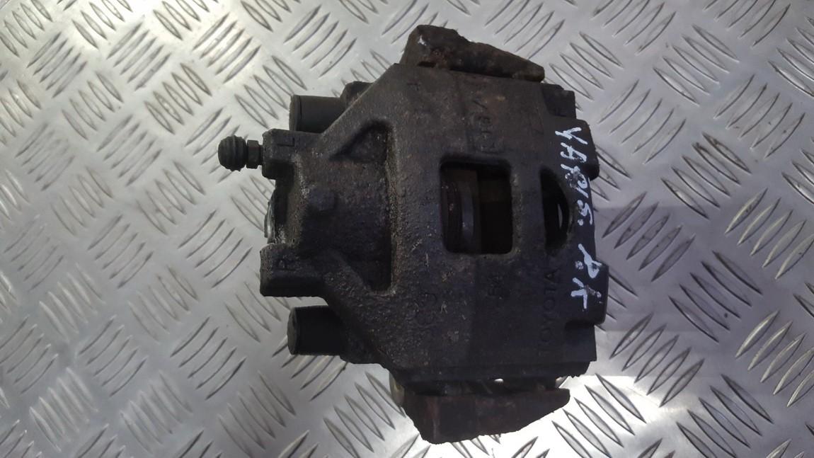 Disc-Brake Caliper front left side used used Toyota YARIS 2006 1.3