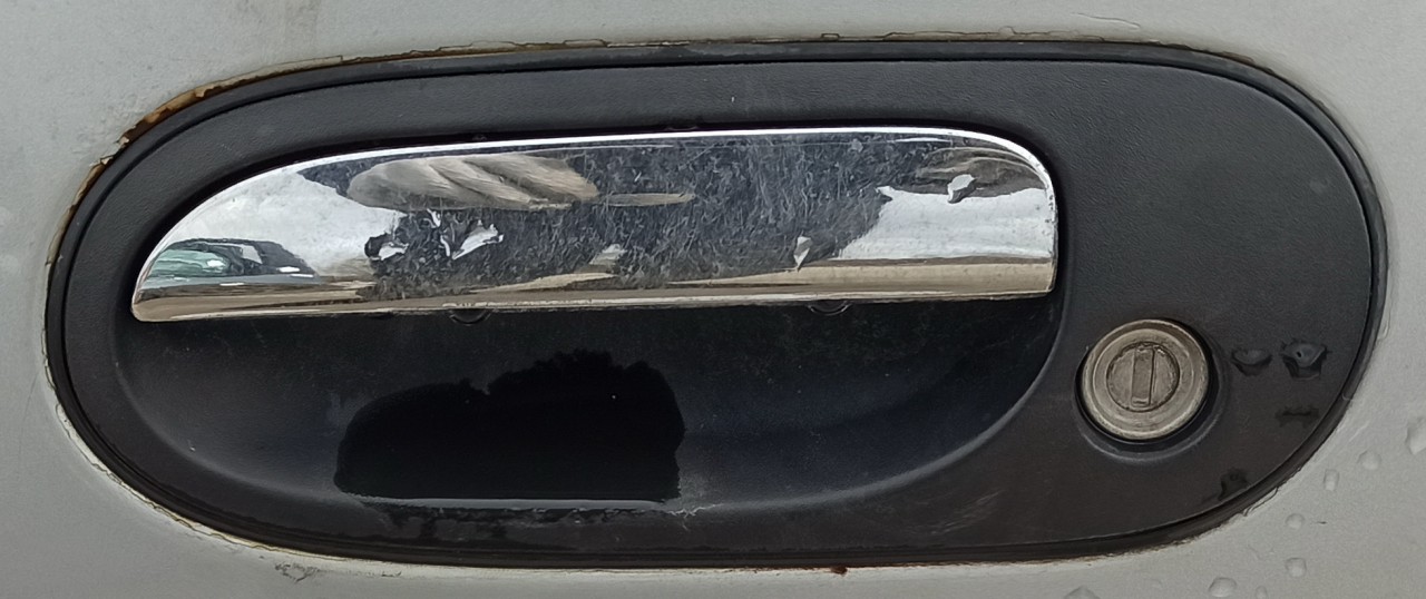 Door Handle Exterior, front left side pilka used Nissan ALMERA TINO 2001 2.2